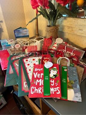 NEW WITH TAGS, CHRISTMAS ASSORTMENT of 42 various size holiday gift bags. 1 wine